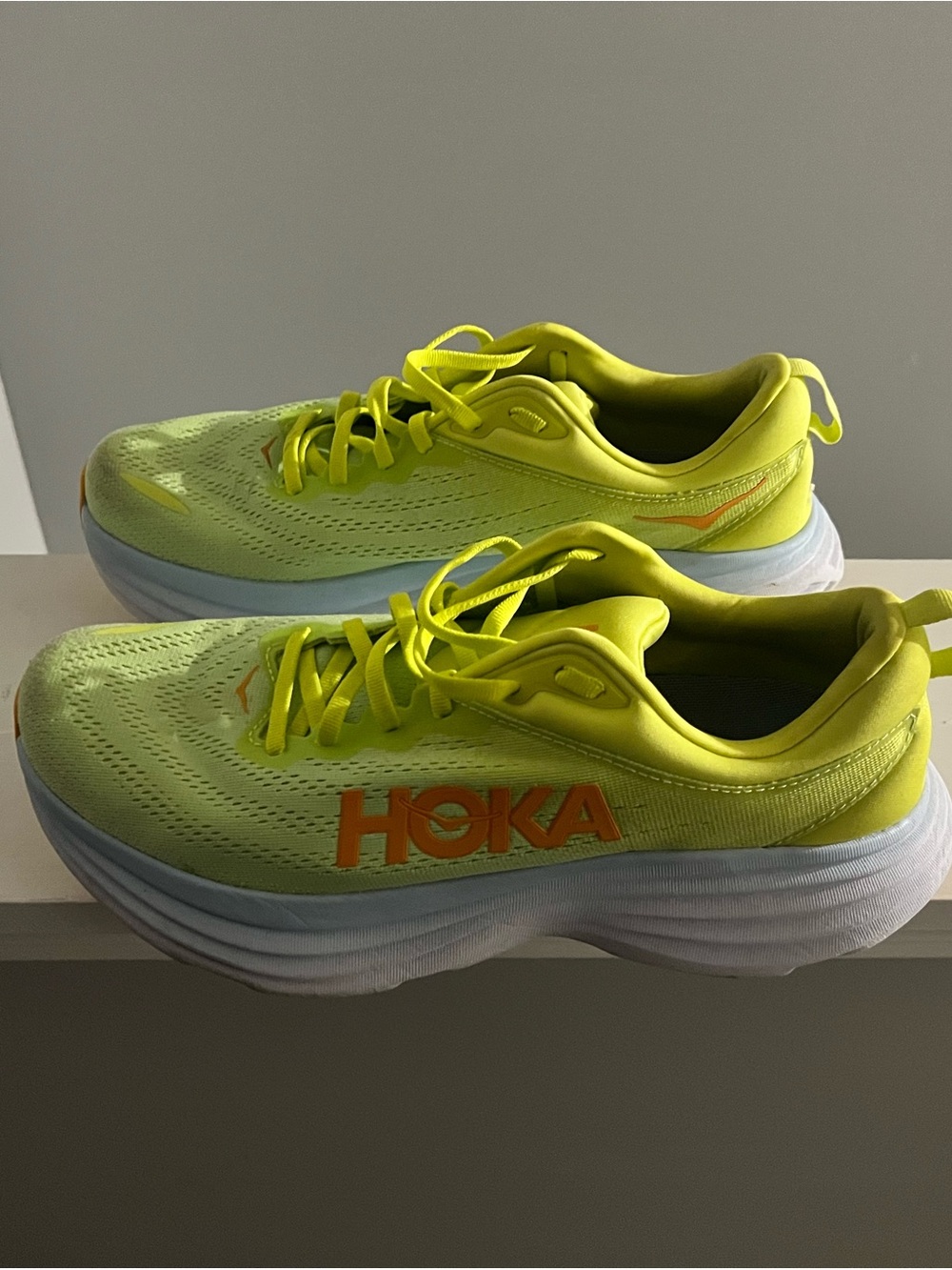 Hoka Bondi 8 Neon Yellow Running Shoes with Orange Logo